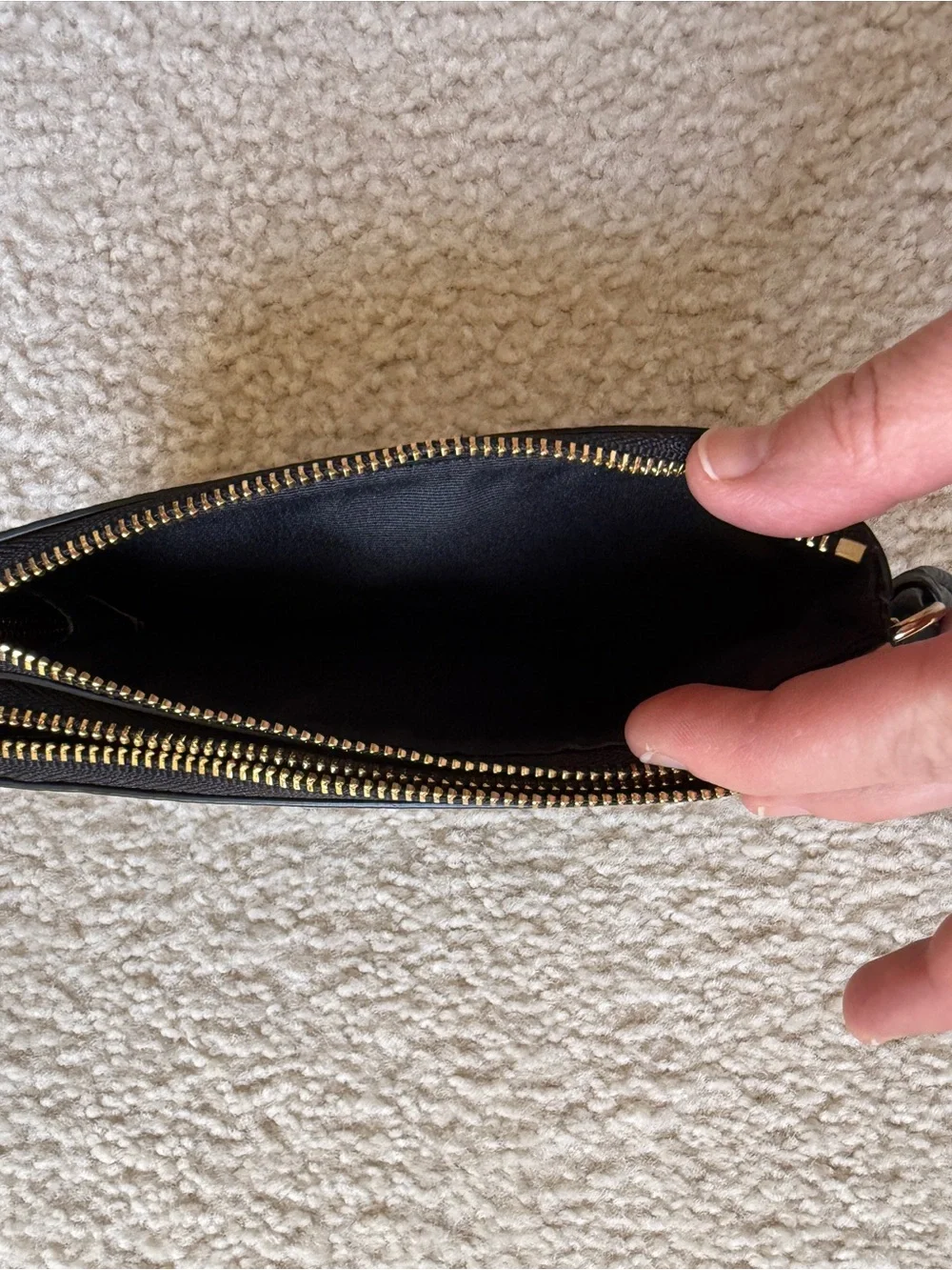 Coach Black Pebbled Leather Pouch with Gold Emblem